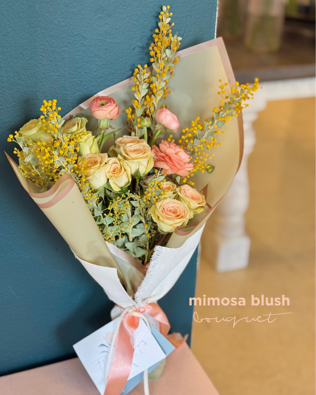 mimosa yellow, spray roses and ranunculus 